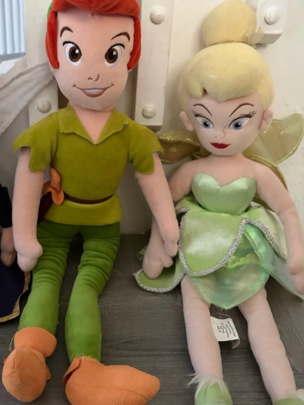 Peter pan plush bundle. Peter pan’s foot was sewn back on.
